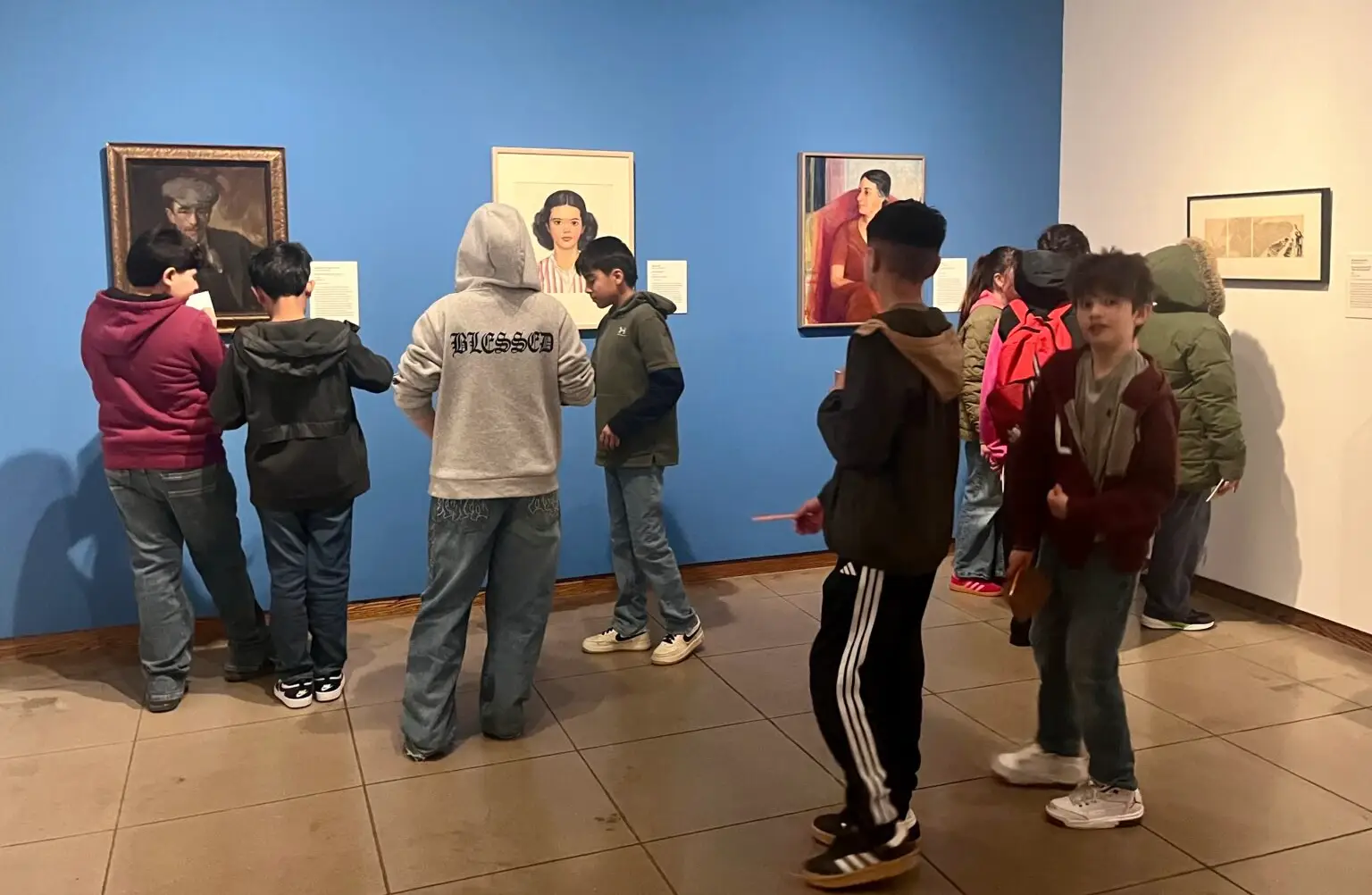 Students from El Camino Real Academy visit the New Mexico Museum of Art.