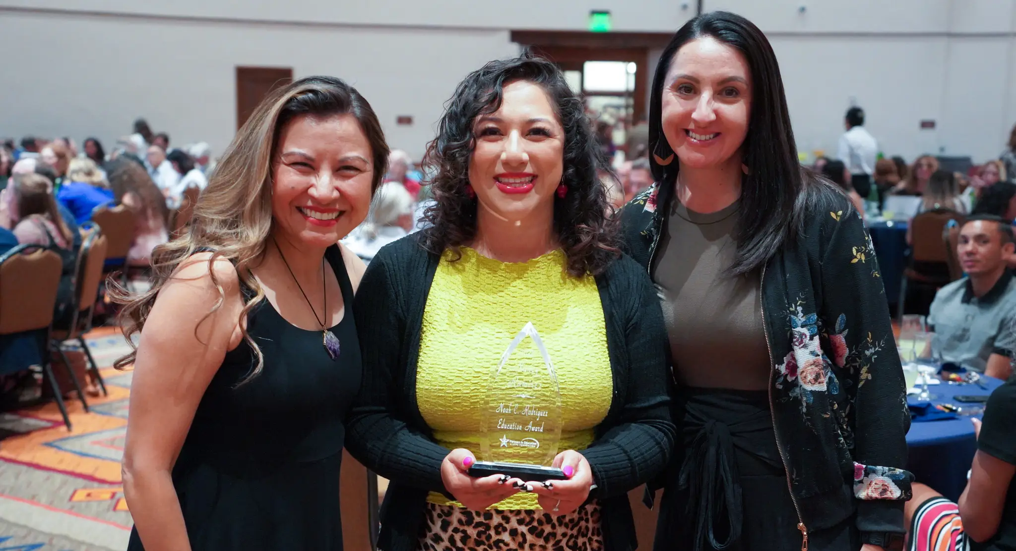 File name: Teachers Who Inspire ABCS Caption: Zelda Sanchez, Digital Learning Coach at Amy Biehl Community School (ABCS); Nancy Ramirez, ABCS Community Schools Coordinator; and ABCS Principal Jessica Garcia celebrate Ramirez's award during the Teacher Who Inspires Celebration.
